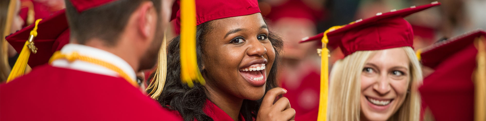 Students Smiling at Graduation